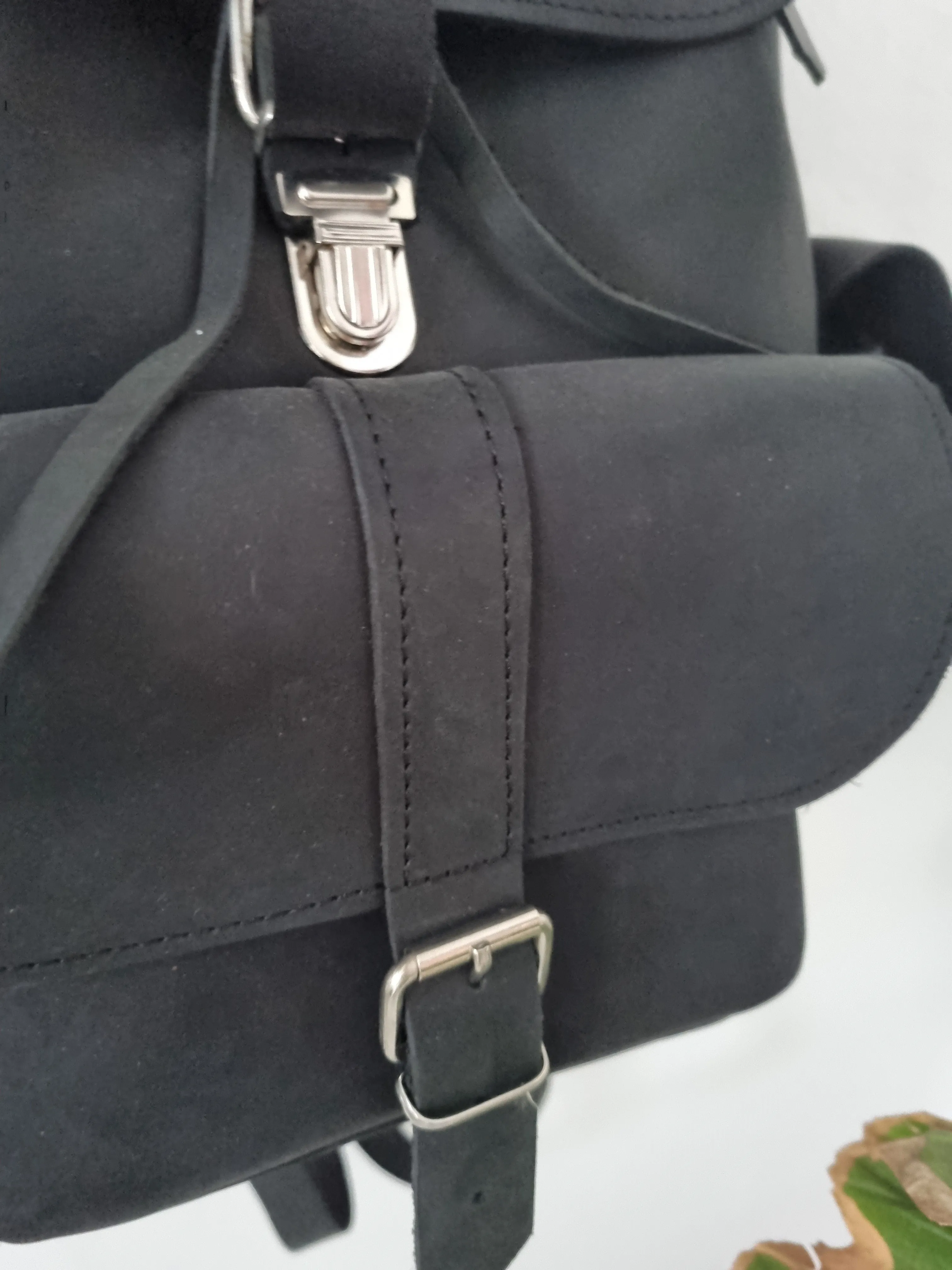 All black leather bag