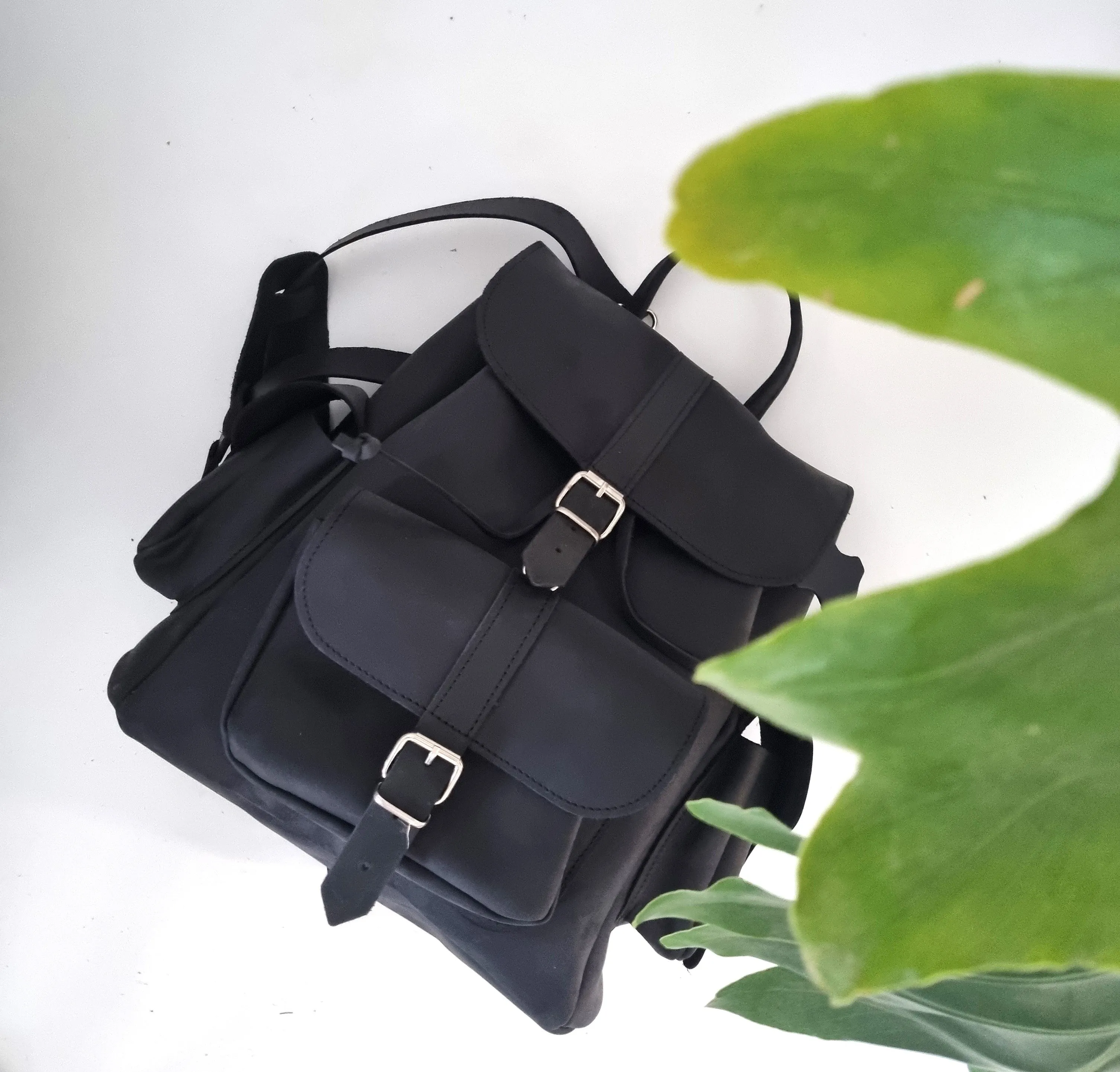 All black leather bag