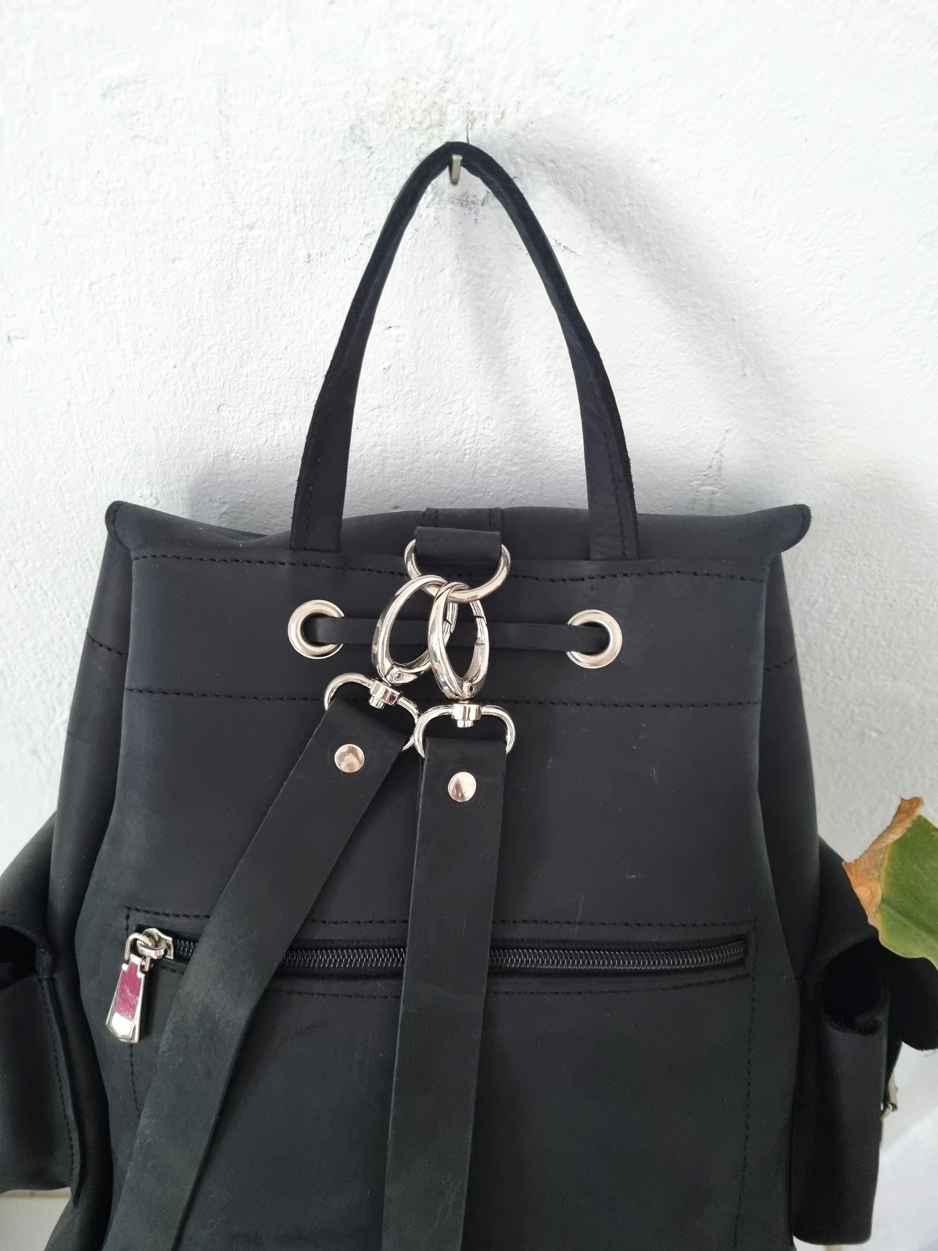 All black leather bag