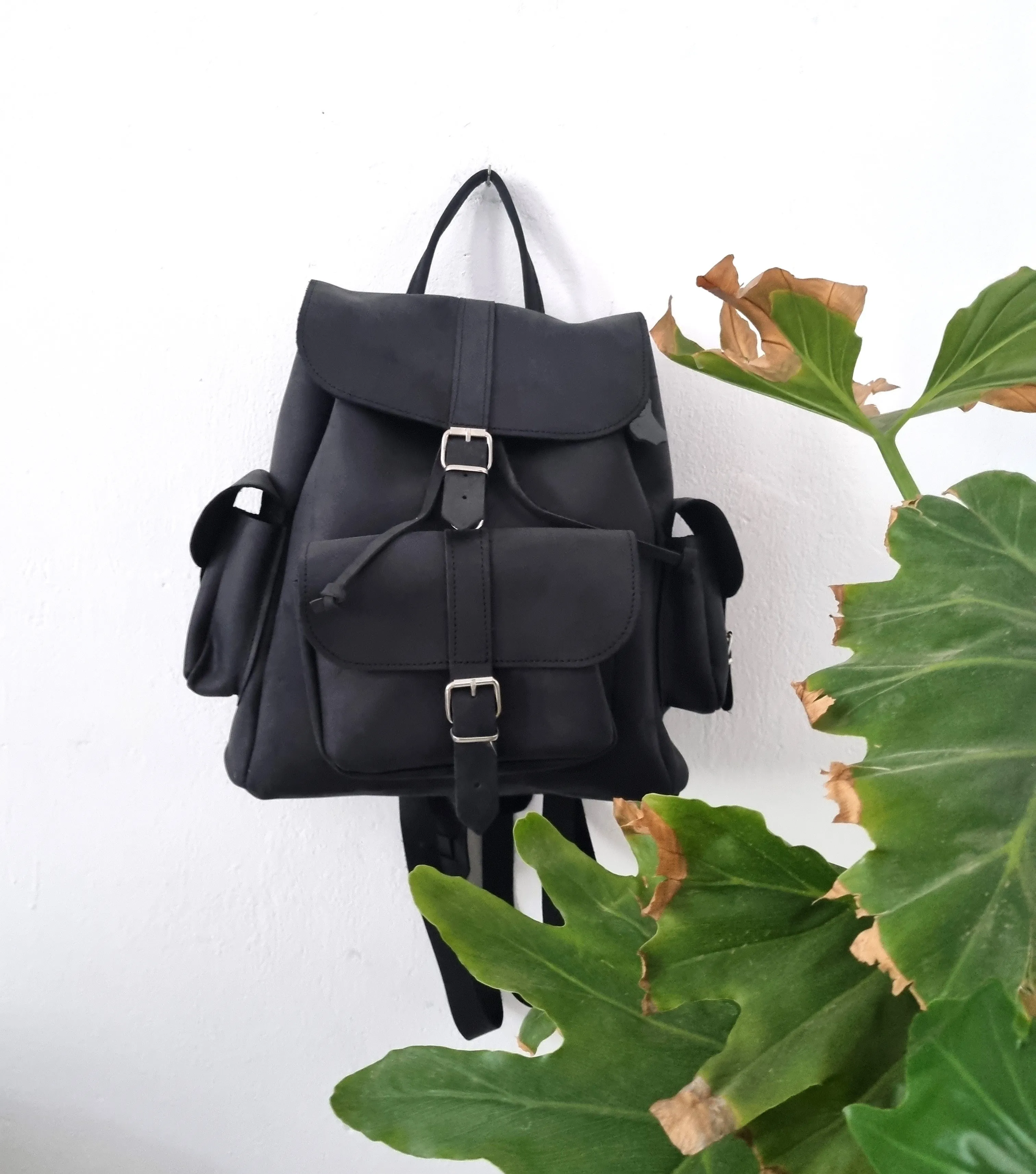 All black leather bag