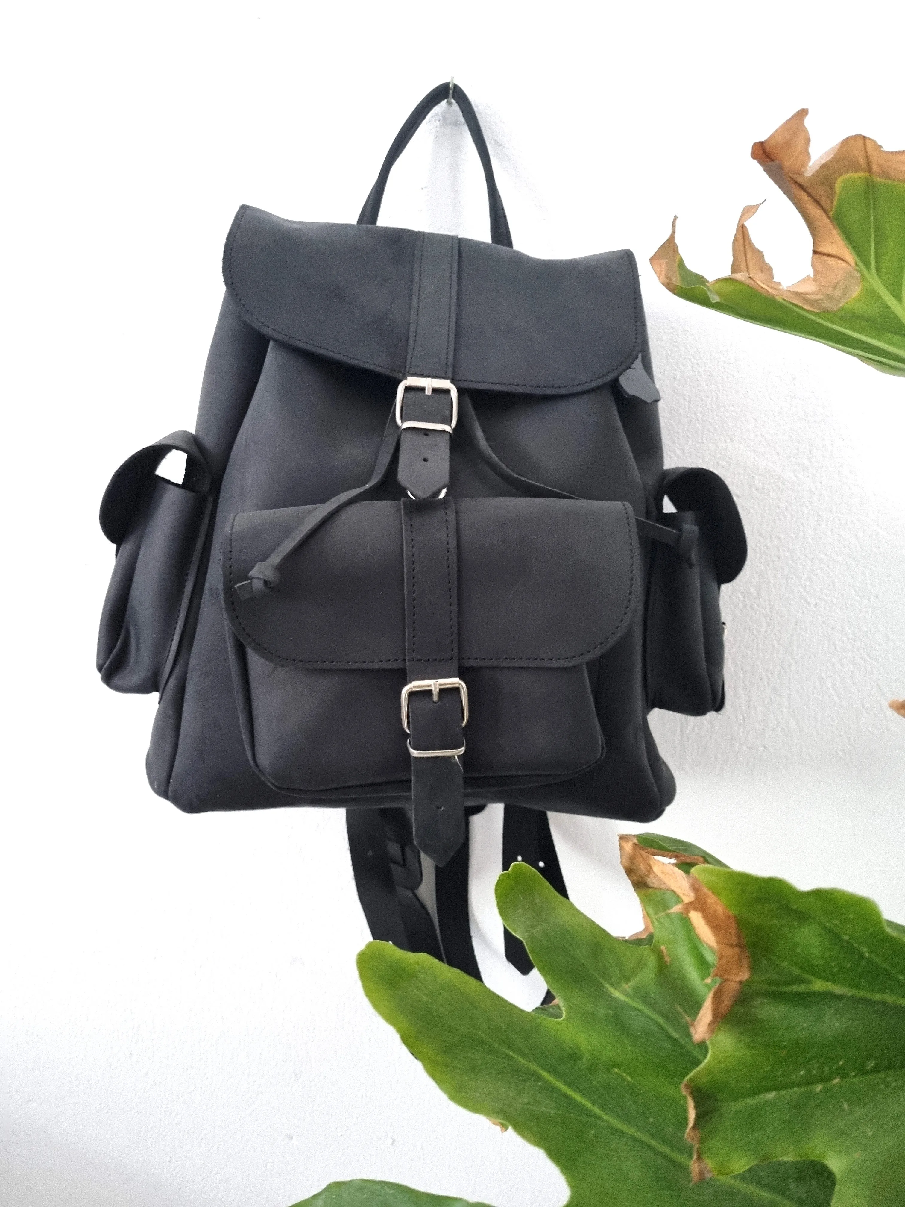 All black leather bag