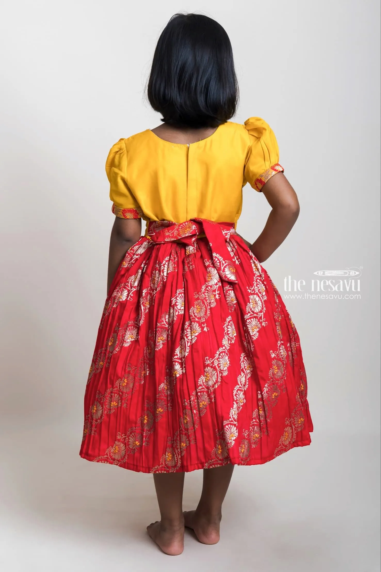 Embroidered Yellow Yoke And Red Brocade Printed Semi-Silk Frocks For Girls