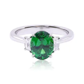 PLATINUM OVAL TSAVORITE GARNET AND DIAMOND THREE-STONE RING